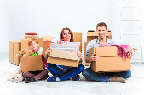Preparing for house removals in Colindale with labeled packing materials