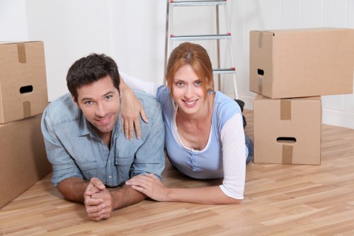 Professional movers handling furniture during a Colindale flat move