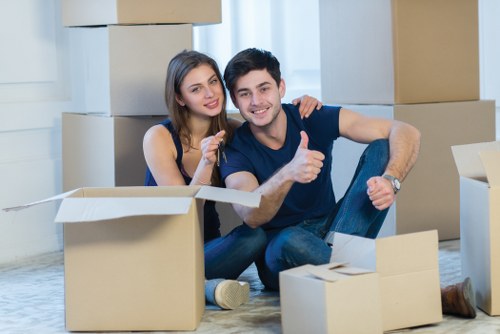 Organized boxes and furniture in a Colindale storage unit